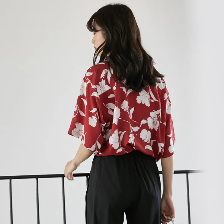 Shortsleeved Blouse With Floral Pattern