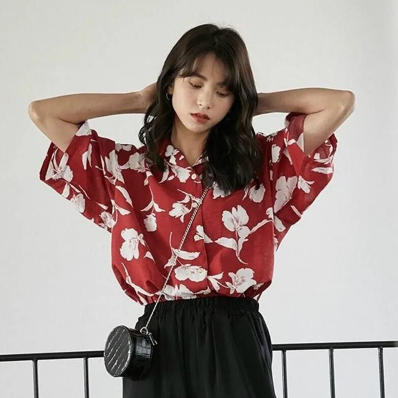 Shortsleeved Blouse With Floral Pattern